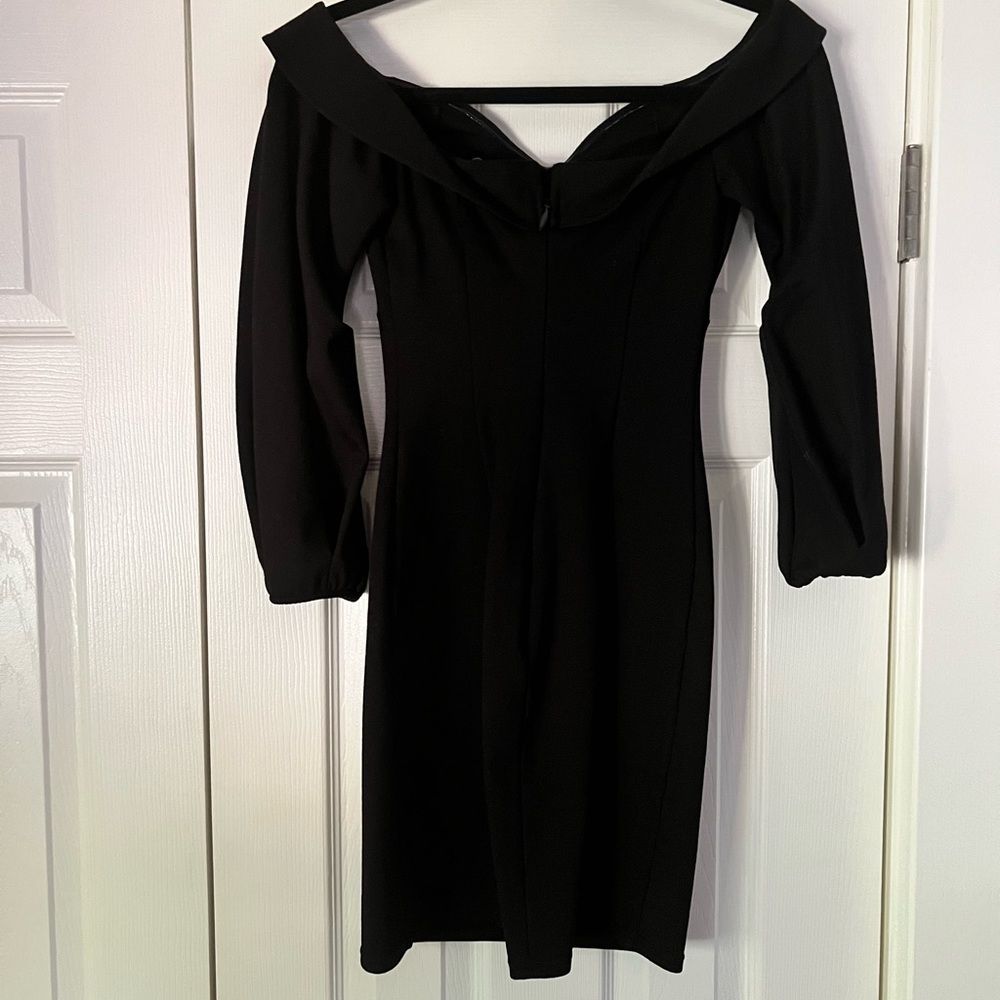 Donna Mizani off the shoulders black dress